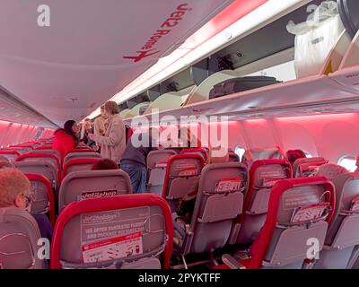 Inside a Jet2 holiday charter aircraft, boarding down the aisle Stock Photo