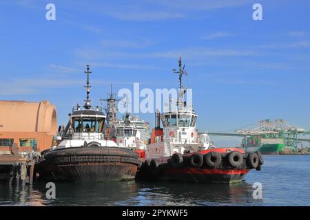 A view of tugboats moored in the port of Los Angeles.  Los Angeles is the busiest container port in North America. Stock Photo