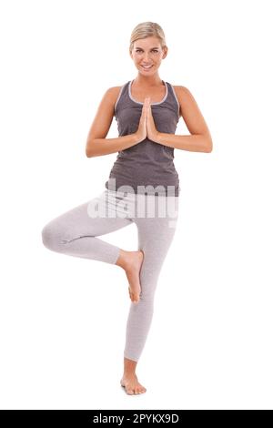 Girl in Tree yoga pose yoga on the balcony Stock Photo - Alamy