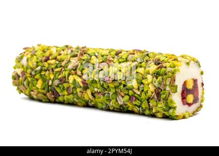 Turkish Delight with Pistachio. Delicious pistachio turkish delight isolated on white background. local name fistikli sarma lokum Stock Photo