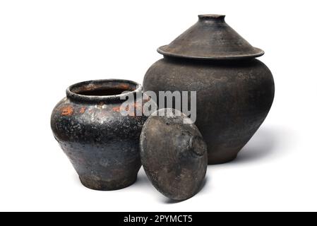 Two ceramics pots on white background. Tradition Ukrainian vintage tableware. Stock Photo