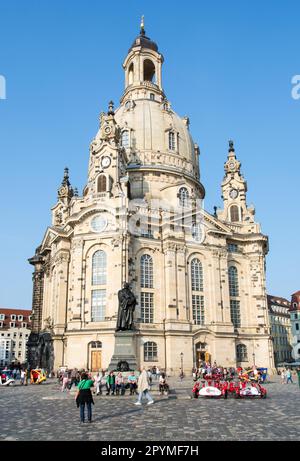 DRESDEN, GERMANY - SEPTEMBER 4: Tourists at the Frauenkirche in Dresden, Germany on September 4, 2014. The church was badly damaged during the Stock Photo