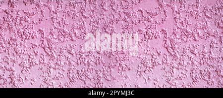 Wide Pink cement wall background for design in your work backdrop. Stock Photo