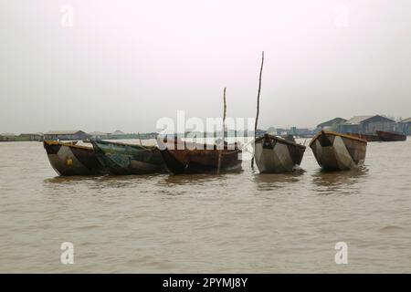 Ondo State, Nigeria - May 2nd, 2023 - Fishermen boats parked on the seaside of Abereke waterway in a riverine community of Ilaje, Ondo State. Stock Photo