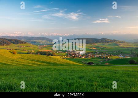 view of Biglen towards the alps in Emmental Stock Photo