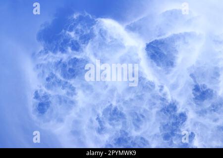 Unusual form of cloud on blue sky Stock Photo