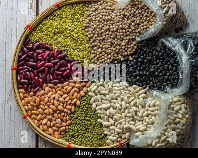 A variety of colorful beans and legumes arranged on a platter Stock Photo