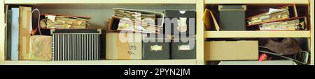 messy file folders and office supplies,red tape, bureaucracy, messy archive, aministration,business concept.Panoramic format Stock Photo