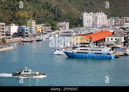 Gushan Marina, small tourist boats and touristic visit boat harbour, Modern pedestrian bridge, Yacht pier, Port of Kaohsiung (高雄港), Taiwan Stock Photo