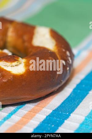 salted pretzel on napkin Stock Photo