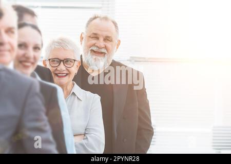close up. a group of diverse business people standing in line. busine Stock Photo