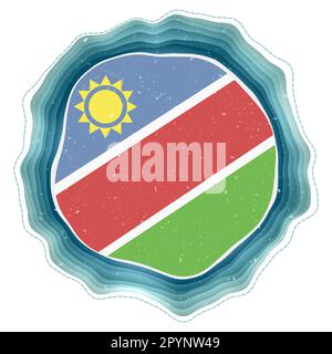 Namibia flag in frame. Badge of the country. Layered circular sign around Namibia flag. Vibrant vector illustration. Stock Vector
