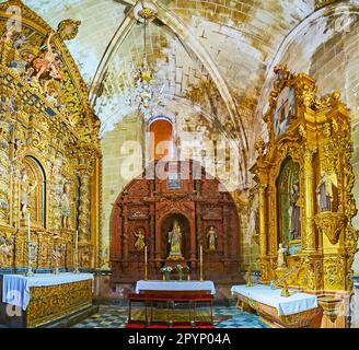 EL PUERTO, SPAIN - SEPT 21, 2019: The richly decorated altarpieces of Virgen del Carmen and Santa Teresa in chapel of  Great Priory Church, on Sept 21 Stock Photo