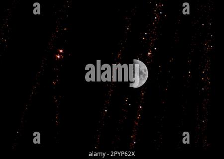 Fireworks in front of the Moon, Pushkar, Rajasthan, India Stock Photo