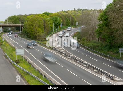 Traffic on the M25 at the Thorpe interchange. The M3 and M25 smart motorways meet at this interchange. Stock Photo