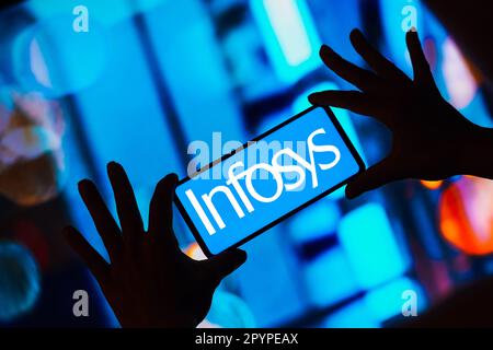 In this photo illustration, the Infosys Limited logo is displayed on a smartphone screen. Stock Photo