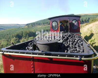 Graf Schwerin-Lowitz locomotive steaming through the Brecon Beacons (Bannau Brycheiniog) from Pant to Torpantau on the Brecon Mountain Railway Stock Photo