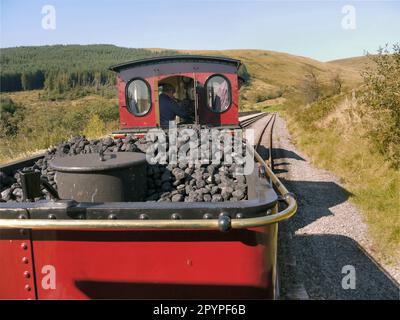 Graf Schwerin-Lowitz locomotive steaming through the Brecon Beacons (Bannau Brycheiniog) from Pant to Torpantau on the Brecon Mountain Railway Stock Photo