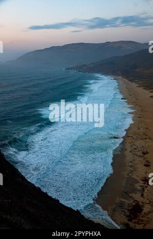 Waves crash on the rocky shores of Big Sur, California Stock Photo