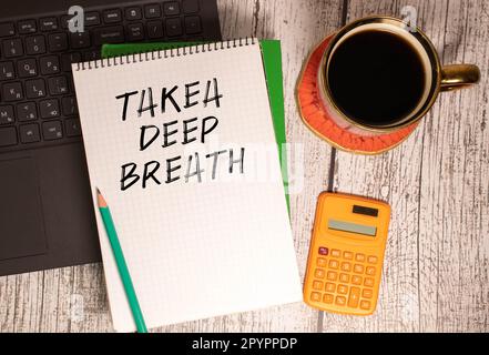 text Takea deep breath on noteboock, concept business Stock Photo