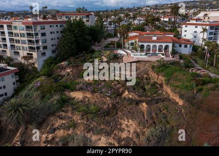 May 4, 2023, San Clemente, California, USA: Aerial view hillside below Casa Romantica Cultural Center and Gardens in San Clemente collapsed Thursday, April 28, 2023 leading rail officials to shut down passenger and freight service between Orange and San Diego counties. The landslide at San Clemente has stopped all rail traffic at a spot two miles north of where the Orange County Transportation Authority recently suspended passenger trains for almost six months and spent more than $13.7 million to stabilize a different slope. The trouble spot is below Casa Romantica, a historic property built i Stock Photo