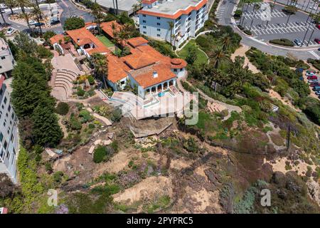 May 4, 2023, San Clemente, California, USA: Aerial view hillside below Casa Romantica Cultural Center and Gardens in San Clemente collapsed Thursday, April 28, 2023 leading rail officials to shut down passenger and freight service between Orange and San Diego counties. The landslide at San Clemente has stopped all rail traffic at a spot two miles north of where the Orange County Transportation Authority recently suspended passenger trains for almost six months and spent more than $13.7 million to stabilize a different slope. The trouble spot is below Casa Romantica, a historic property built i Stock Photo