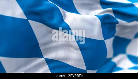 Close-up of the Bavaria civil flag waving in the wind. Blue and white lozenges pattern. Bavaria is a state in the south-east of Germany. 3d illustrati Stock Photo