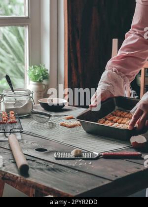 the making process of kaastangel, cheesy cookies. one of favourite cookies in lebaran or ied al fitr or islamic festive or celebration. made with edam Stock Photo