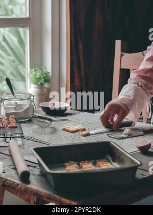 the making process of kaastangel, cheesy cookies. one of favourite cookies in lebaran or ied al fitr or islamic festive or celebration. made with edam Stock Photo