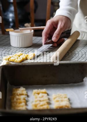 the making process of kaastangel, cheesy cookies. one of favourite cookies in lebaran or ied al fitr or islamic festive or celebration. made with edam Stock Photo