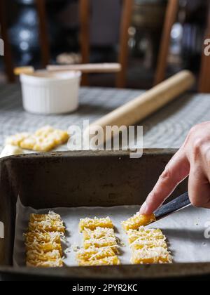 the making process of kaastangel, cheesy cookies. one of favourite cookies in lebaran or ied al fitr or islamic festive or celebration. made with edam Stock Photo