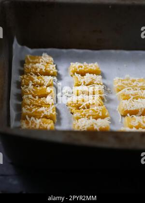 the making process of kaastangel, cheesy cookies. one of favourite cookies in lebaran or ied al fitr or islamic festive or celebration. made with edam Stock Photo