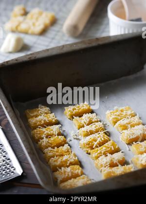 the making process of kaastangel, cheesy cookies. one of favourite cookies in lebaran or ied al fitr or islamic festive or celebration. made with edam Stock Photo