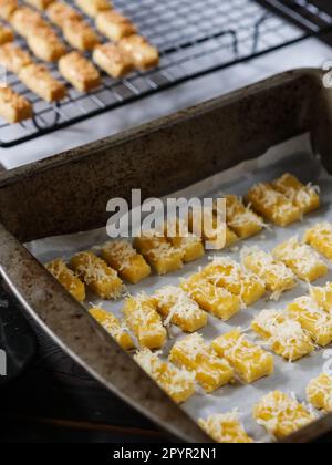 the making process of kaastangel, cheesy cookies. one of favourite cookies in lebaran or ied al fitr or islamic festive or celebration. made with edam Stock Photo