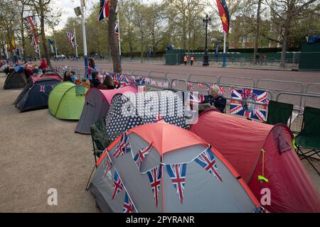 London, UK. 4th May, 2023. Royal fans camp on The Mall ahead of the Coronation, The Coronation of King Charles III and The Queen Consort will take place on May 6 2023. Credit: Lucy North/Alamy Live News Stock Photo