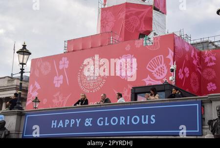 London, UK. 04th May, 2023. A huge coronation emblem on the National Gallery and a banner stating 'Happy and glorious' seen in Trafalgar Square ahead of the coronation of King Charles III, which takes place on May 6th. Credit: SOPA Images Limited/Alamy Live News Stock Photo