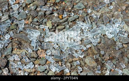 Cycle path broken glass vandalism Stock Photo