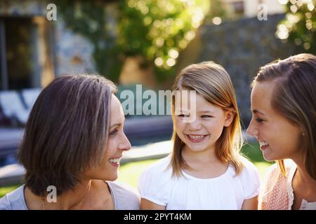 Grandmas know how to make you smile. three happy generations of women. Stock Photo