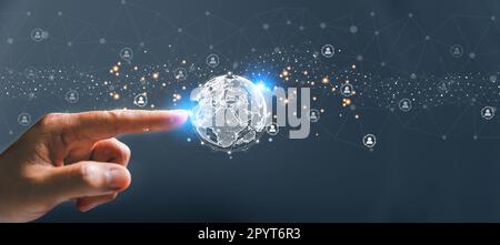 Big data analytics and business intelligence concept. Business person holding Global network connection. World map point and line composition of globa Stock Photo