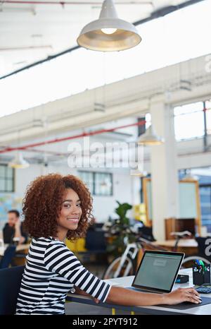 Developing tomorrows tech today. a designer at their workstation in an office. Stock Photo