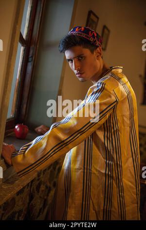 Uzbek man in Traditional outfit Stock Photo