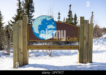 The Arctic Circle official sign on the Dalton Highway in Alaska Stock Photo