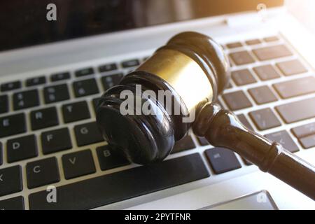 Selective focus image of judge gavel and keyboard. Cybercrime, legal, law and online auction concept Stock Photo