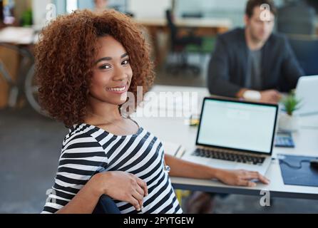 Developing tomorrows tech today. a designer at their workstation in an office. Stock Photo