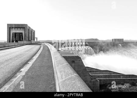 The Gariep Dam overflowing. The dam is the largest in South Africa. It is in the Orange River on the border between the Free State and Eastern Cape Pr Stock Photo