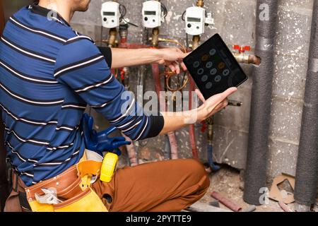 Cropped shot view Manager Technical Industrial Engineer working and control robotics with monitoring system software and industry network connection Stock Photo