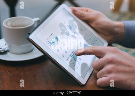 dashboard data analytics on the screen of digital tablet computer, financial report statistics Stock Photo