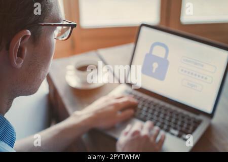 data protection and internet security concept, user typing login and password on computer, secured access Stock Photo