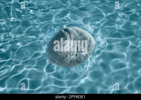 Close up pebble shaped driftwood splashing in shallow water Stock Photo