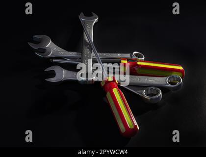 Screwdriver, wrenches are tools for repairing and connecting mechanical elements, especially used by mechanics. Stock Photo